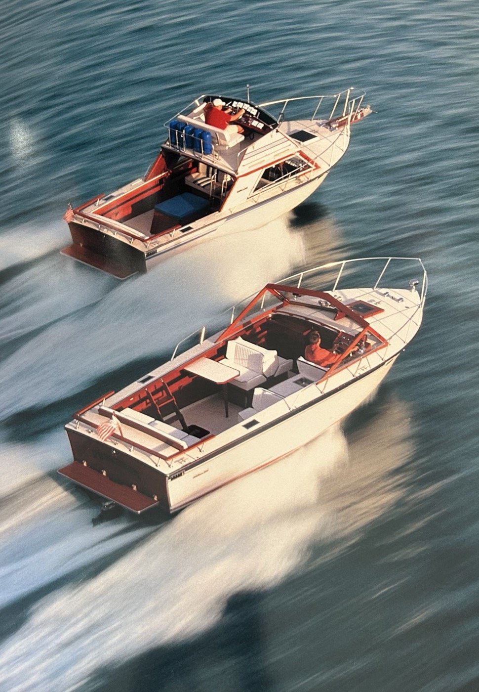 Two classic Skiff Craft boats underway on a Minnesota lake.